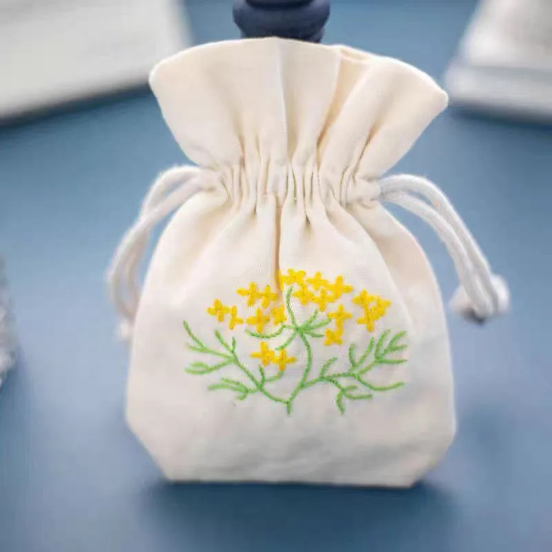 Beige Textured Fabric Drawstring Pouch