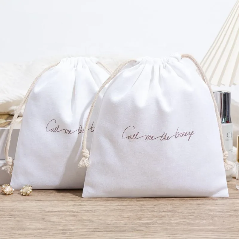 Cream Textured Fabric Drawstring Pouch