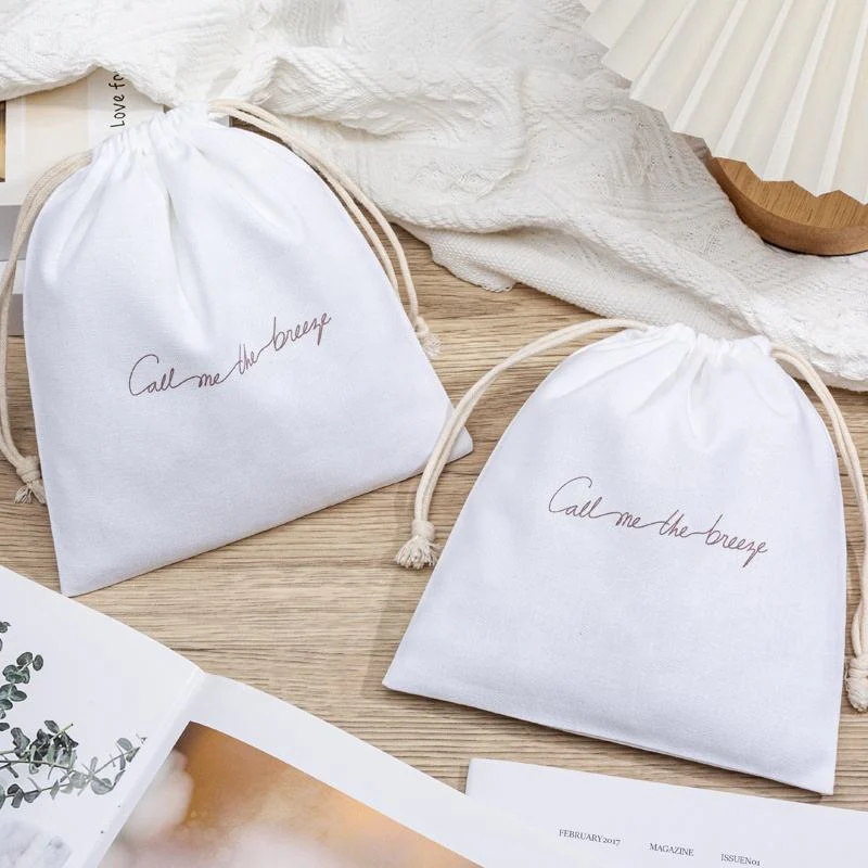 Cream Textured Fabric Drawstring Pouch — image 3