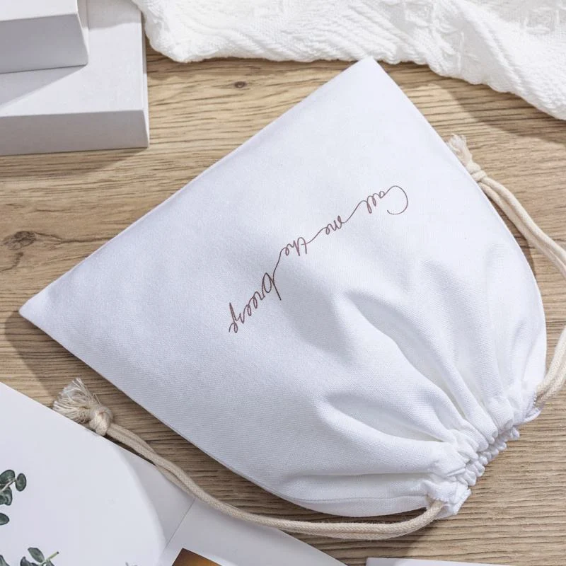 Cream Textured Fabric Drawstring Pouch — image 4