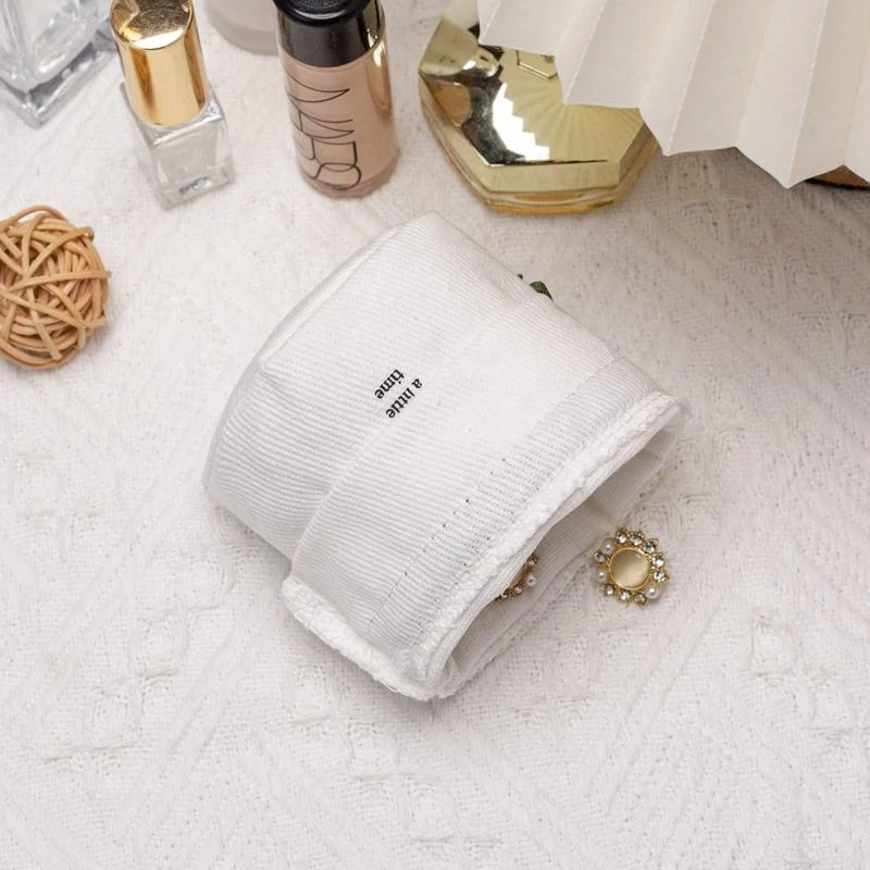 Textured Fabric Drawstring Pouch — image 5