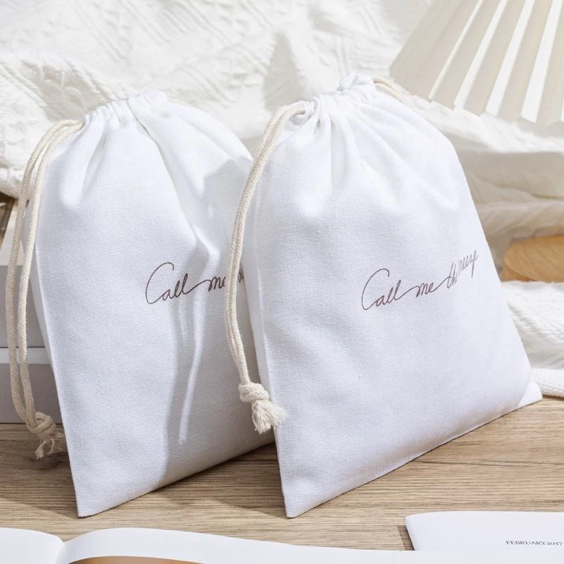 Cream Textured Fabric Drawstring Pouch — image 2